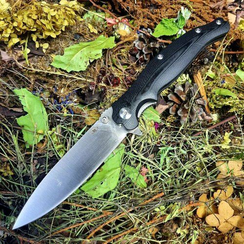 фото Большой складной нож вояж-01, сталь d2, черная рукоять g10 reptilian