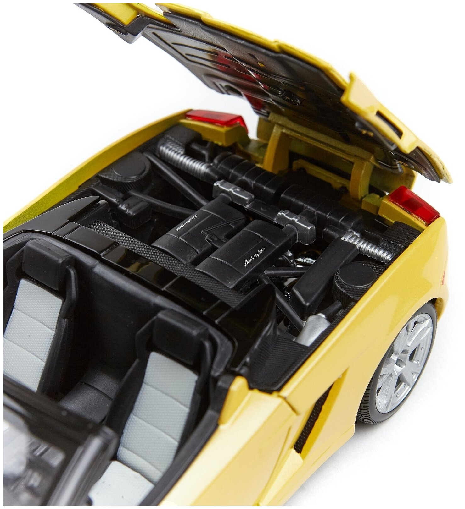 Bburago Коллекционная машинка 1:18 Lamborghini Gallardo Spyder, 18-12016, желтая - фото №9