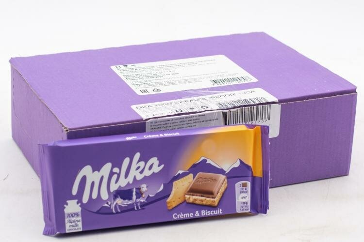 Шоколад Milka Cream & Biscuit c прослойкой нежного крема и печеньем 100 гр Упаковка 18 шт