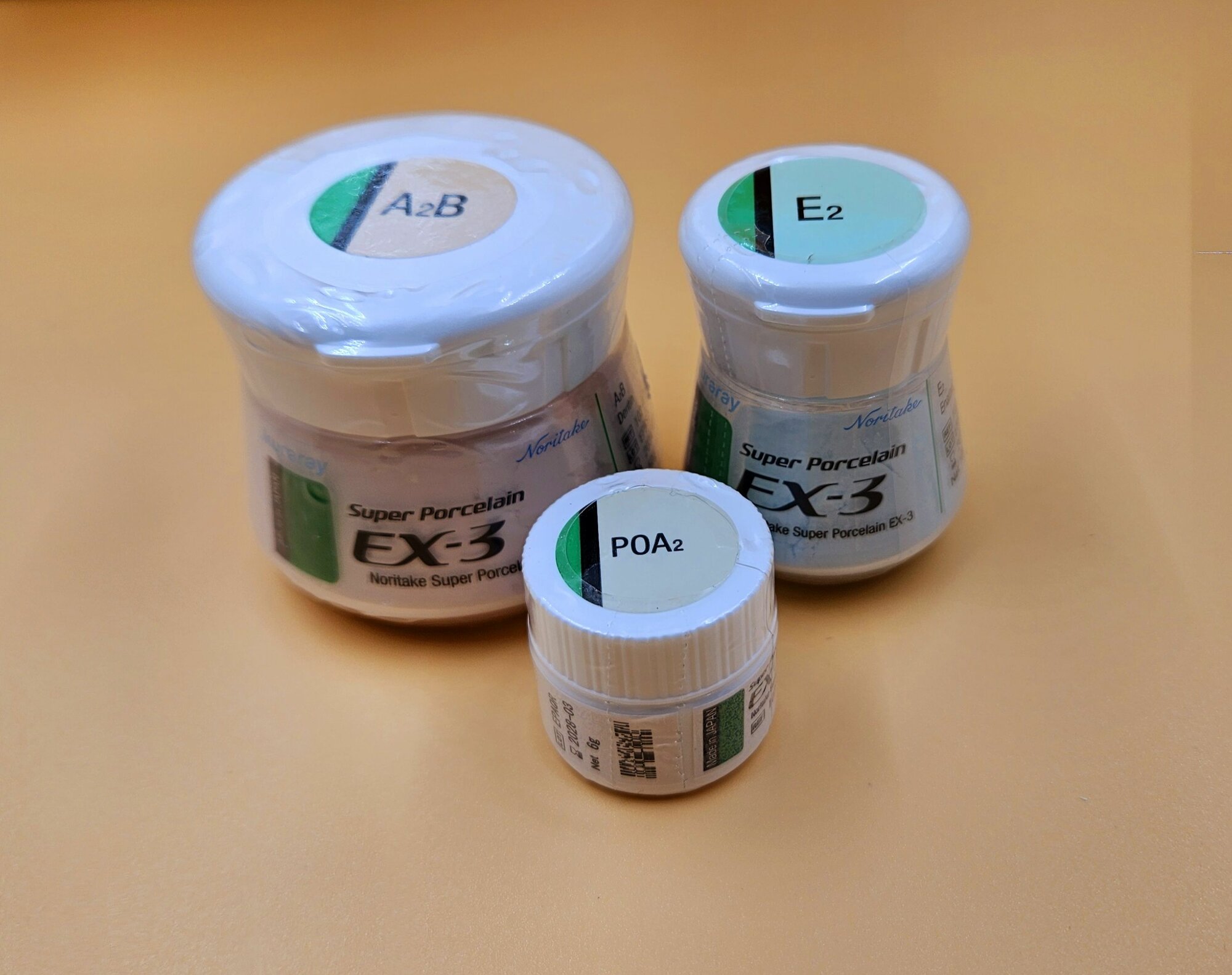 Керамическая масса Noritake набор Цвет А2. Body A2B 50 гр, опак пастообразный POA2 6 гр, эмаль E2 10гр. (Япония)