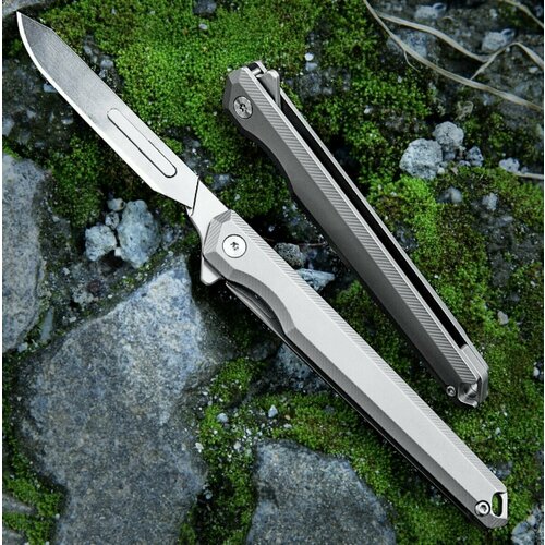 фото Складной нож из титанового сплава нет бренда