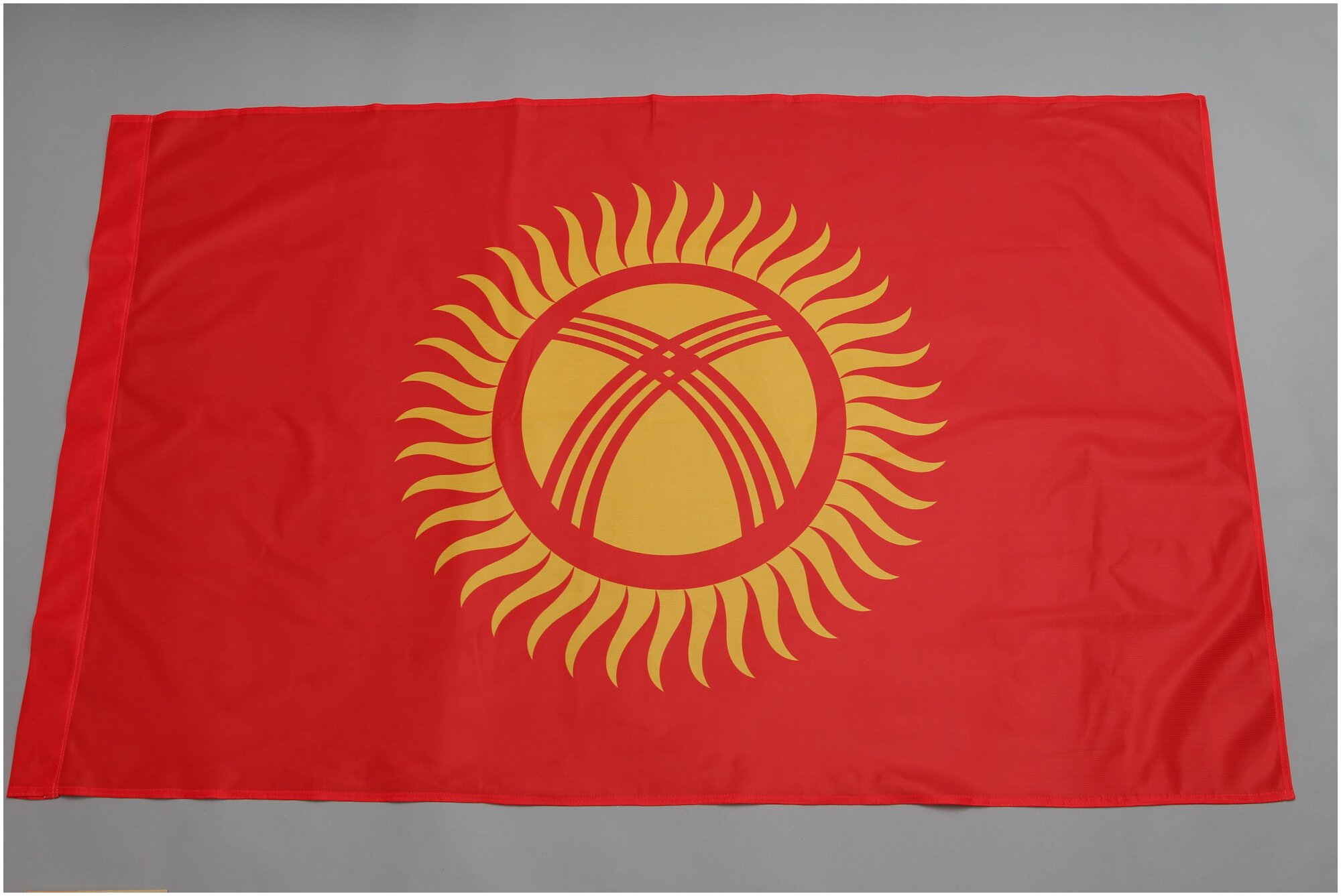 Флаг Киргизия 90х135, ( флажная сетка, карман слева), юнти