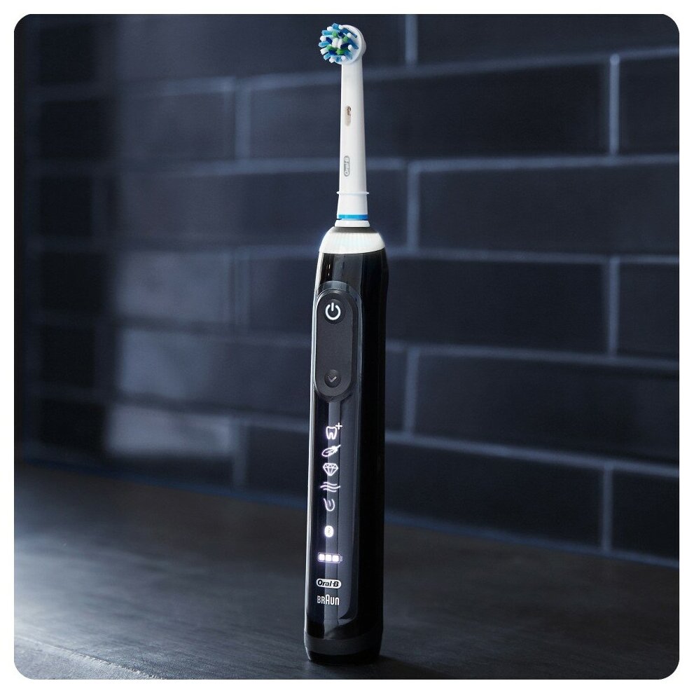 Электрическая зубная щетка Oral-B Genius 10000N D701.525.6XC, midnight black - фотография № 4