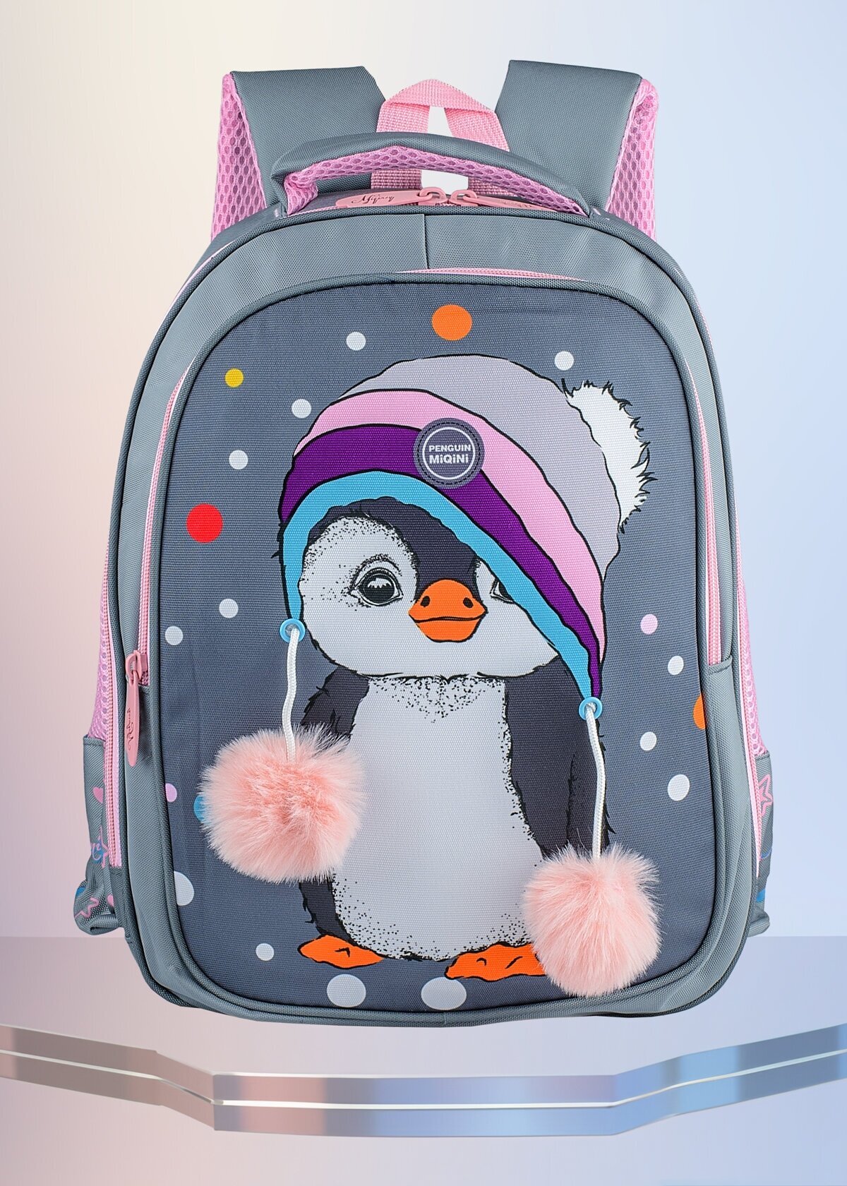 Школьный рюкзак для девочки с помпончиками серый с розовым