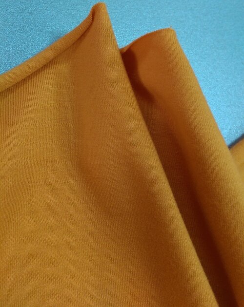 Ткань Трикотаж хлопковый оранжевого цвета Италия