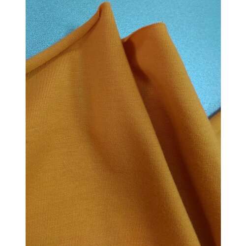 ткань трикотаж холодок оранжево жёлтого цвета италия Ткань Трикотаж хлопковый оранжевого цвета Италия