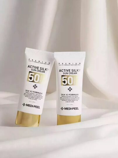 Солнцезащитный крем с пептидами шелка, SPF 50+ Крем для лица Солнцезащитный крем — фото 1