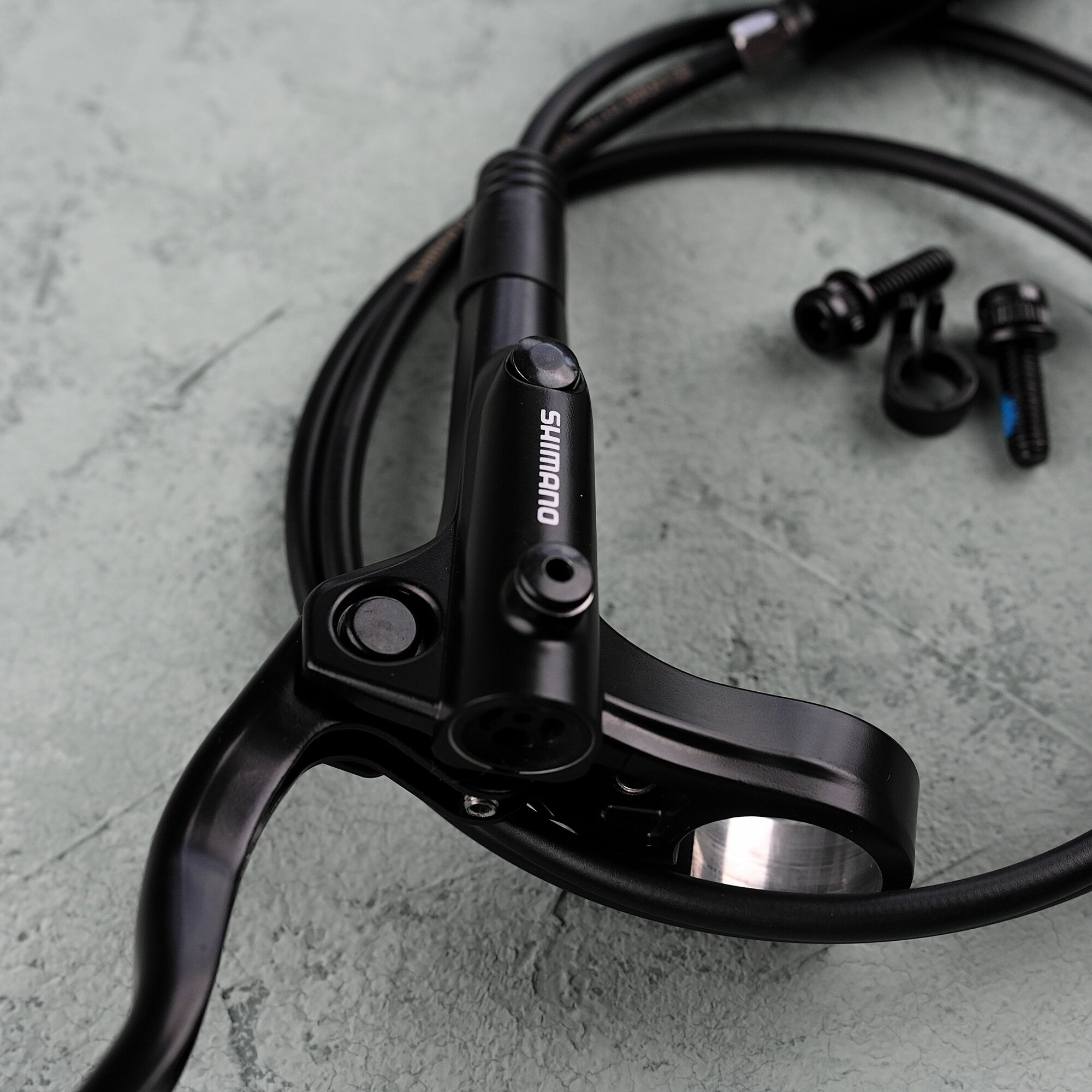 Комплект дисковых гидравлических тормозов Shimano MT200, передний (левый) 800 мм / задний (правый) 1450 мм — фото 1