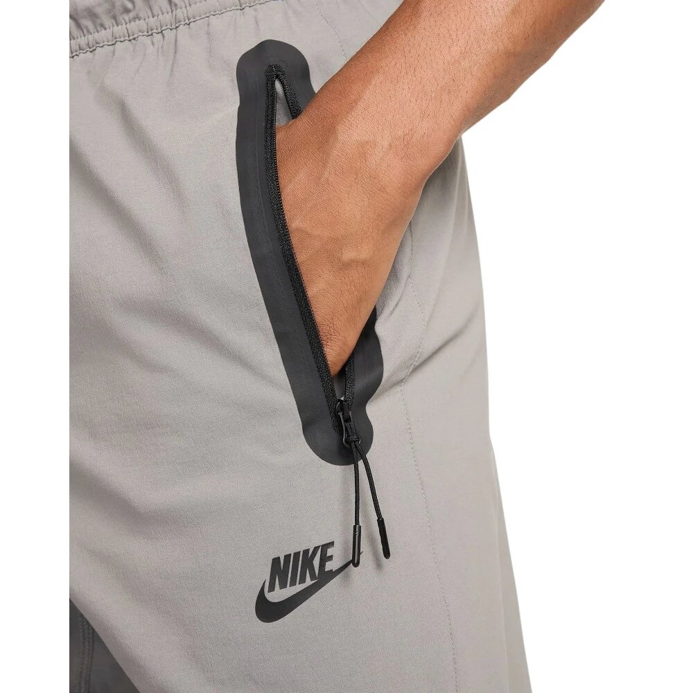 Брюки NIKE, размер M INT, серый — фото 1
