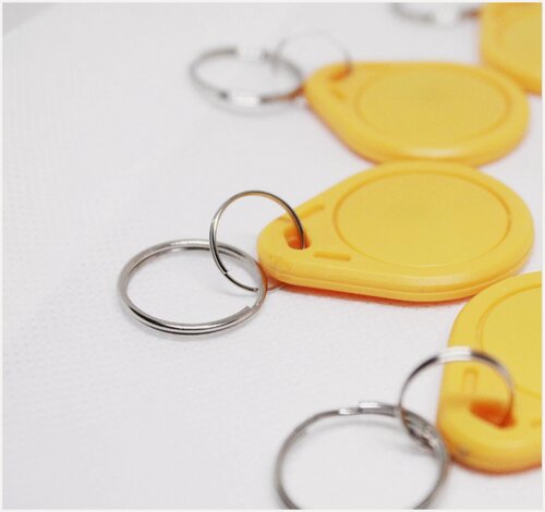 Изображение товара Ключ для домофона Mifare Zero 100шт перезаписываемый . Частота 13,56 МГц Желтый цвет