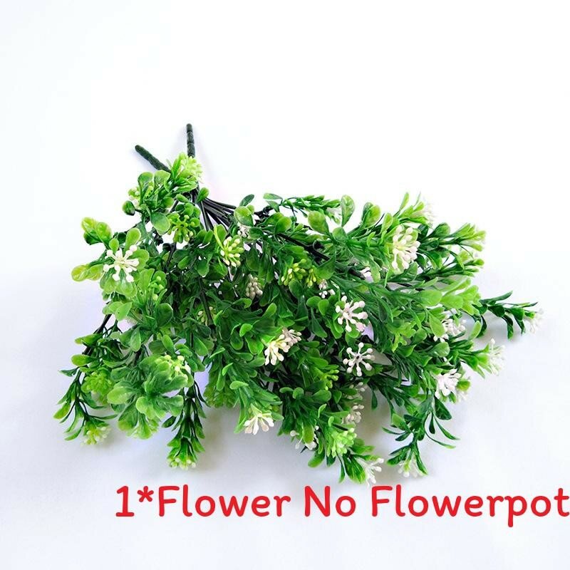 Green faux plant for home decorating and event setting with realistic leaves