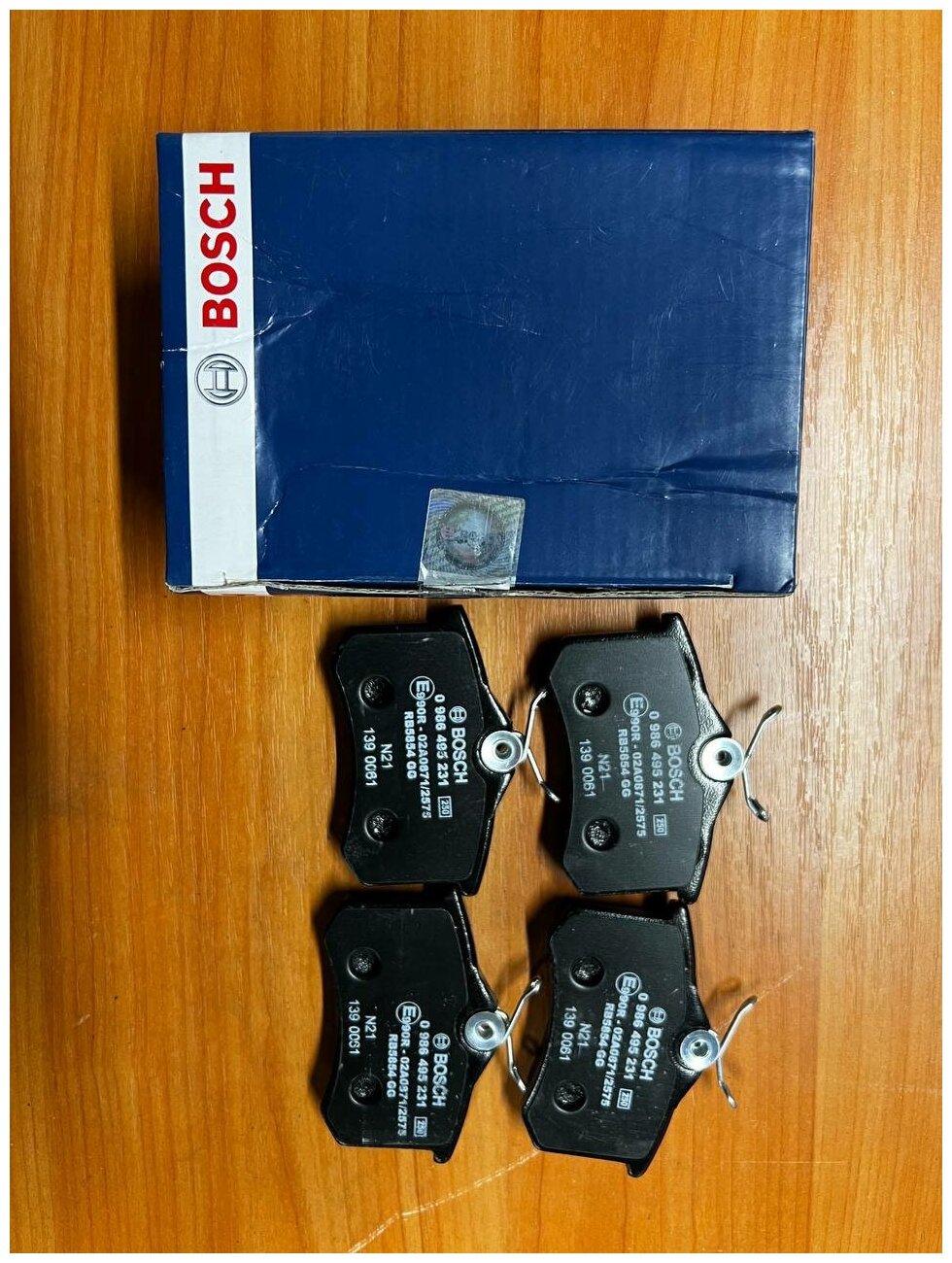 Дисковые тормозные колодки задние Bosch 0986495231 (4 )