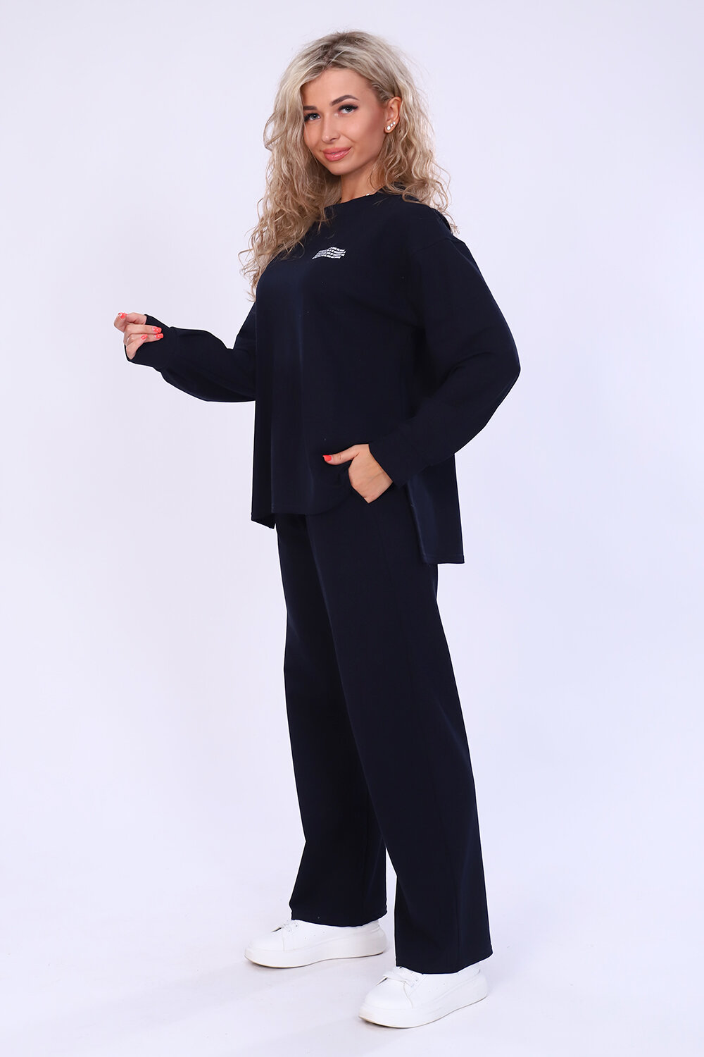 Модный женский костюмчик из плотной ткани, цвета черный, размер 54 - фотография № 2