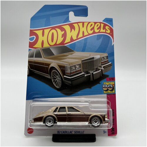 Hot Wheels Детская Машинка 1:64 82 CADILLAC SEVILLE Из серии HW THE 80S hot wheels 82 toyota supra детская машинка хот вилс 1 64 из серии hw the 80s подарок мальчику