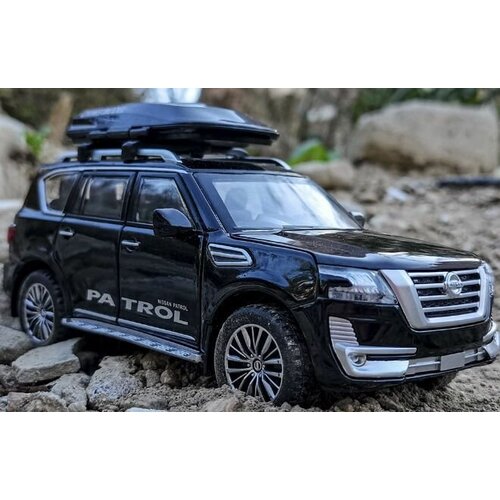 Модель автомобиля Nissan Patrol - Масштаб 1/32