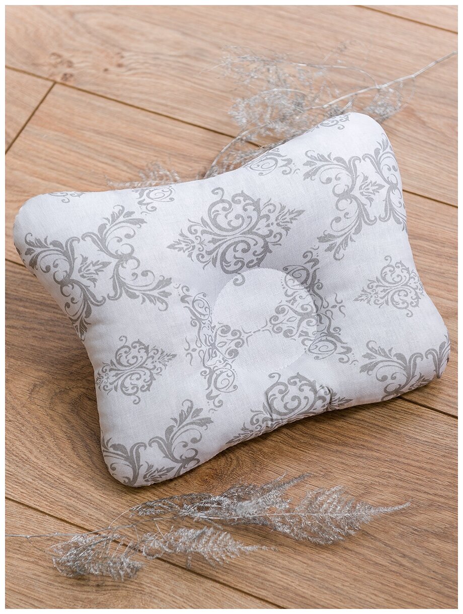 фото Подушка ортопедическая для малышей BIO-TEXTILES "МАЛЮТКА+" 27*24 с искусственным лебяжьим пухом бязь для новорожденных под шею анатомическая маленькая для сна в коляску