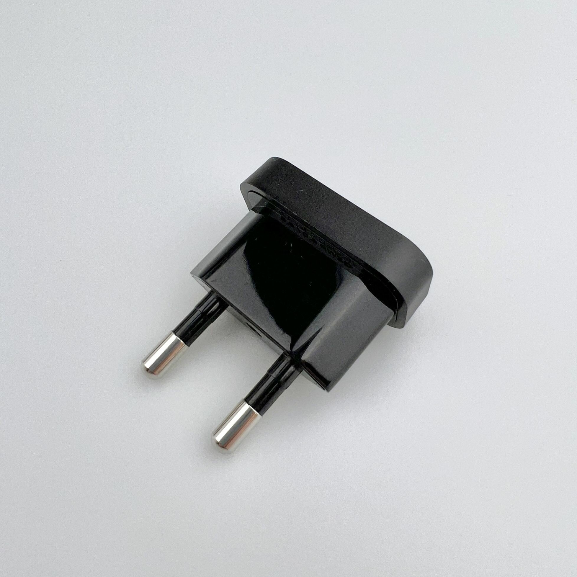 фото Универсальный сетевой адаптер переходник с американской / китайской вилки на евровилку / розетку, цвет Черный