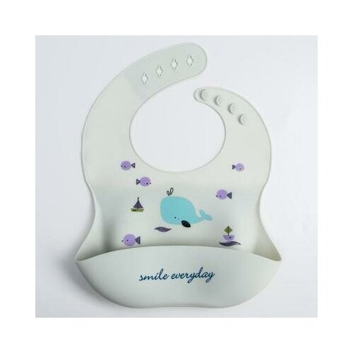 фото Нагрудник силиконовый, на кнопках, с карманом"кит", цвет белый mum&baby . newstory
