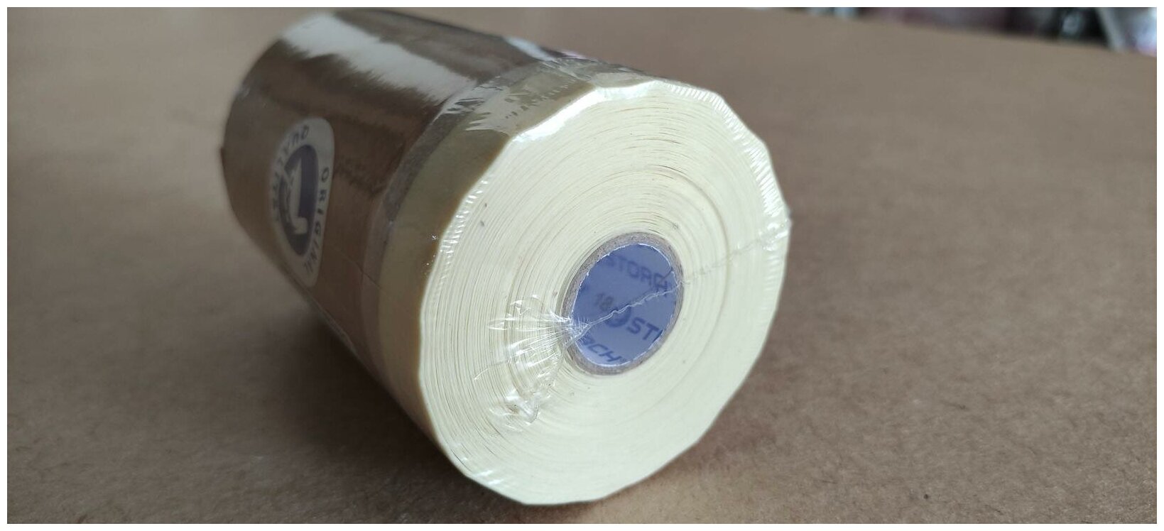 Укрывочная защитная бумага с малярной лентой 18 см х 25 м STORCH для малярных работ, покраски - фотография № 5
