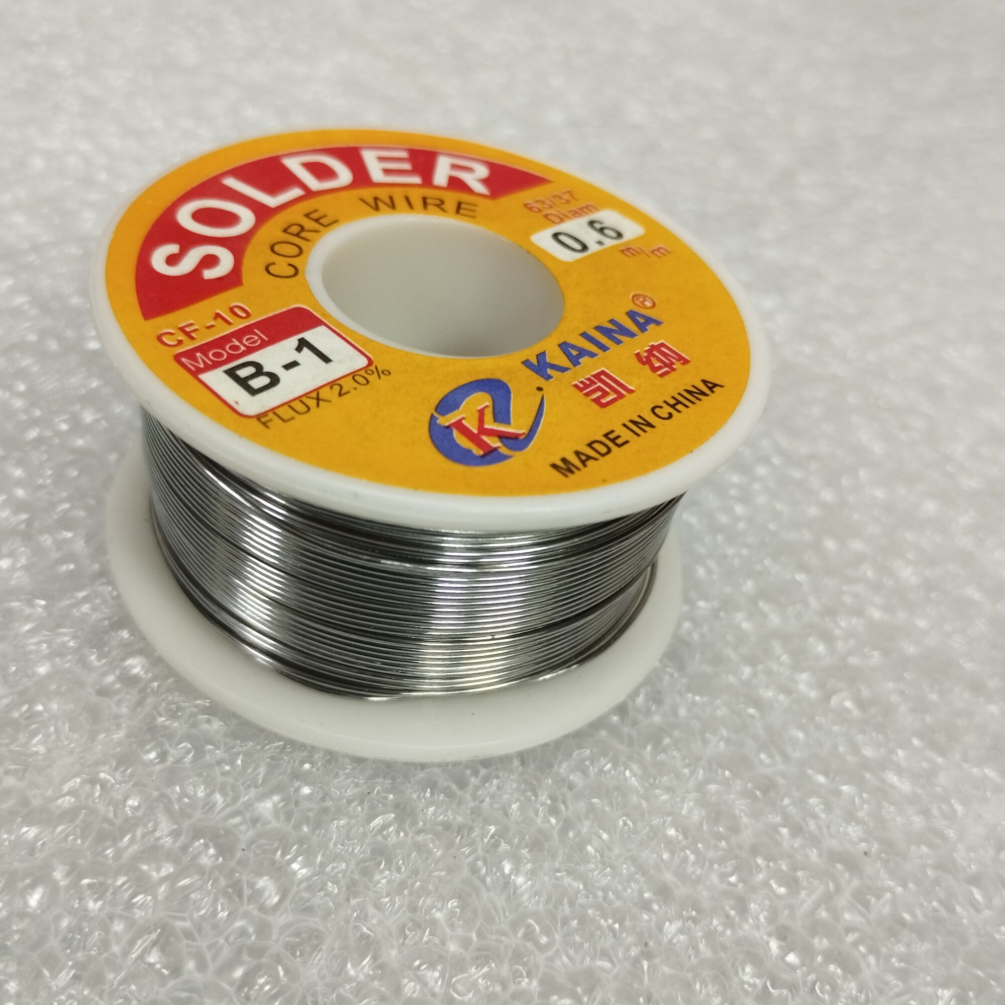 Изображение Припой SOLDER D-0.6 мм, с флюсом, 100гр, POS 63 катушка с канифолью KAINA
