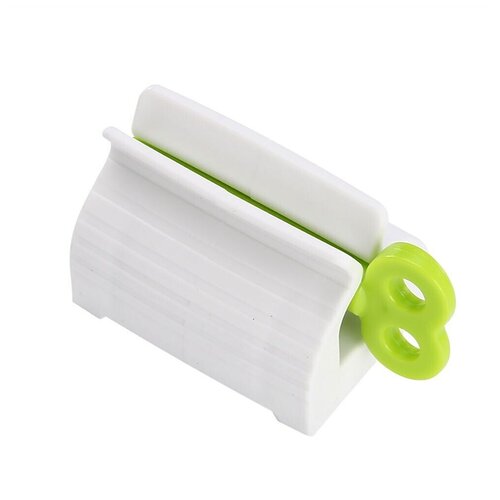 Пресс - диспенсер для выдавливания зубной пасты, зеленый