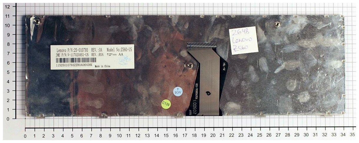 Клавиатура для ноутбука Lenovo 25-012436 черная с серой рамкой ножка крепежа находится рядом со шлейфом