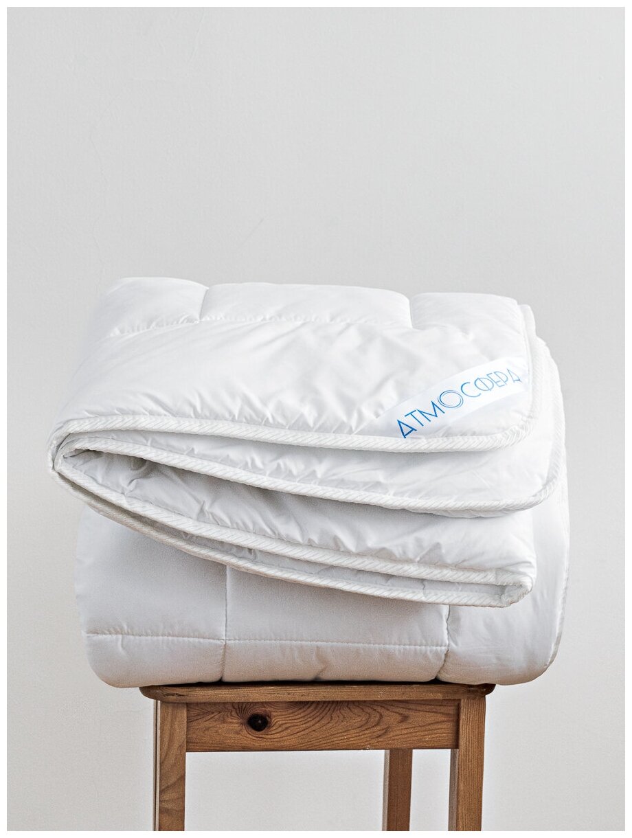 Одеяло 1,5 спальное лебяжий пух 142х205 гипоаллергенное - фотография № 9