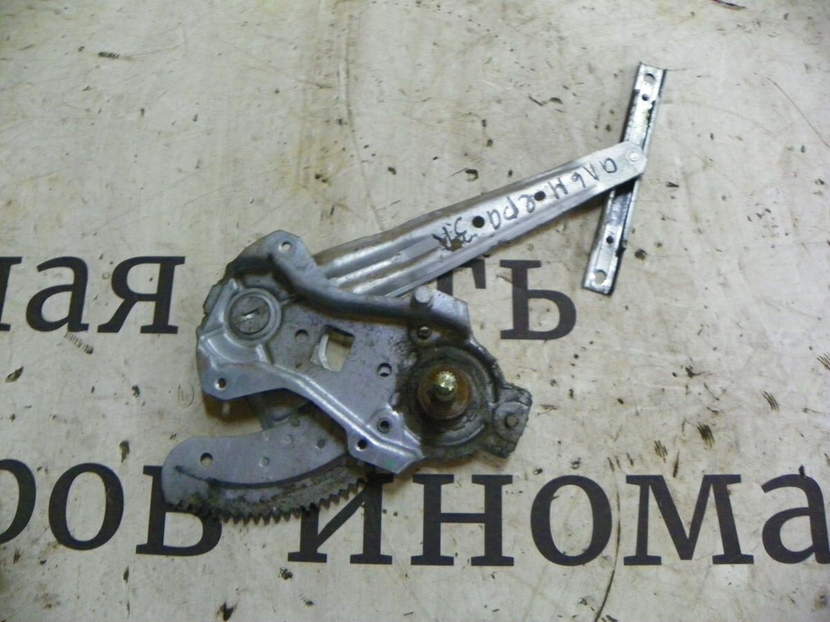 Стеклоподъемник механ. задний правый Nissan Almera N16 рестайлинг (2002—2006) 82700BM710
