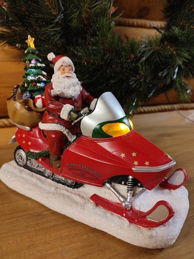 Сувенир музыкальный "Санта на снегоходе". 25х11х20 см.