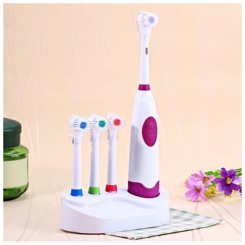 Электрическая зубная щетка VITTOVAR с 4 насадками на подставке фиолетовая 68900₽