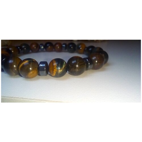 фото Браслет из натурального соколиного глаза 8 мм с вставками из гематита уральские камни