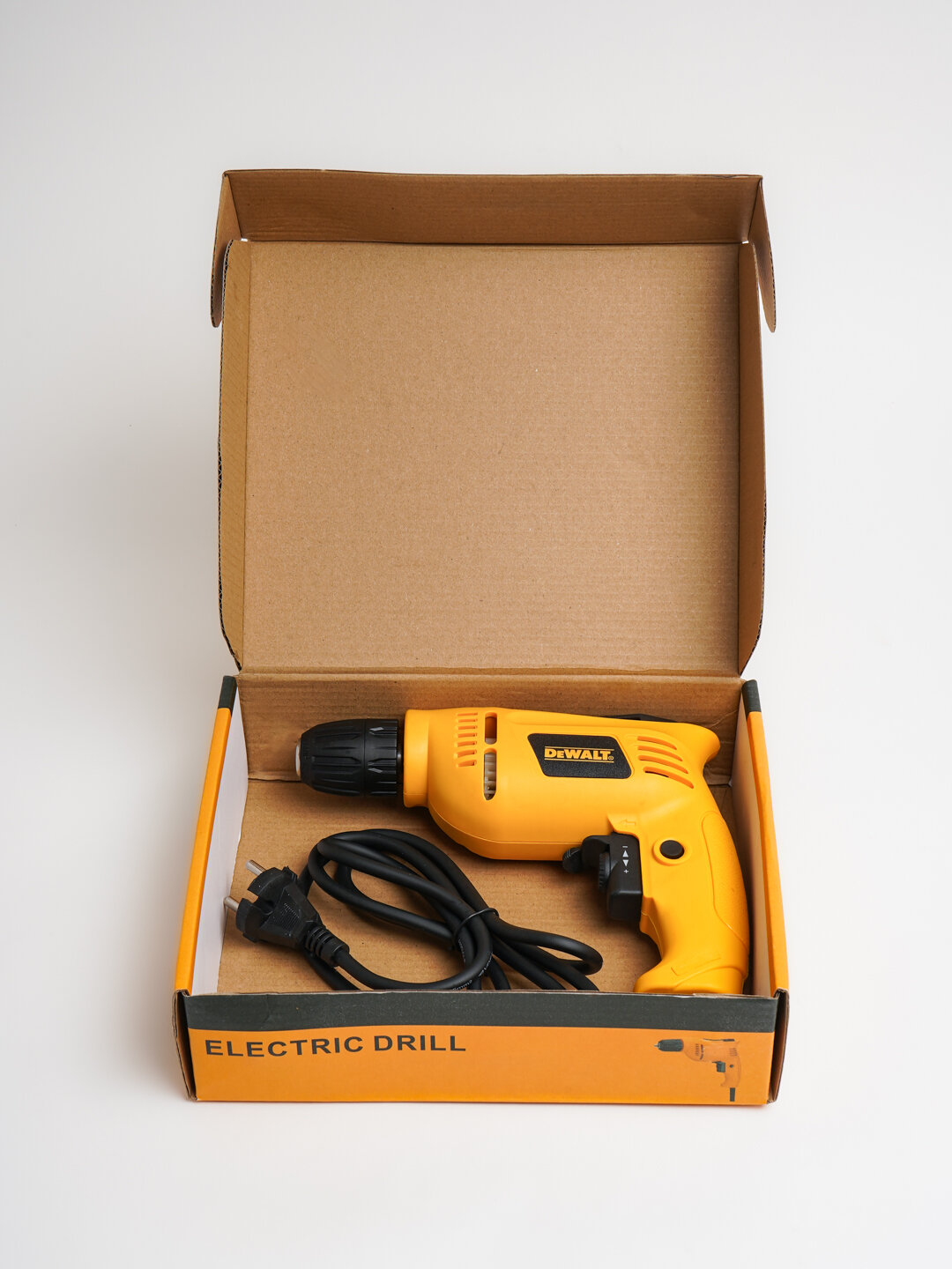 Электрический дрель Dewalt 350 Вт : сетевой, быстрозажимной патрон. — фото 1