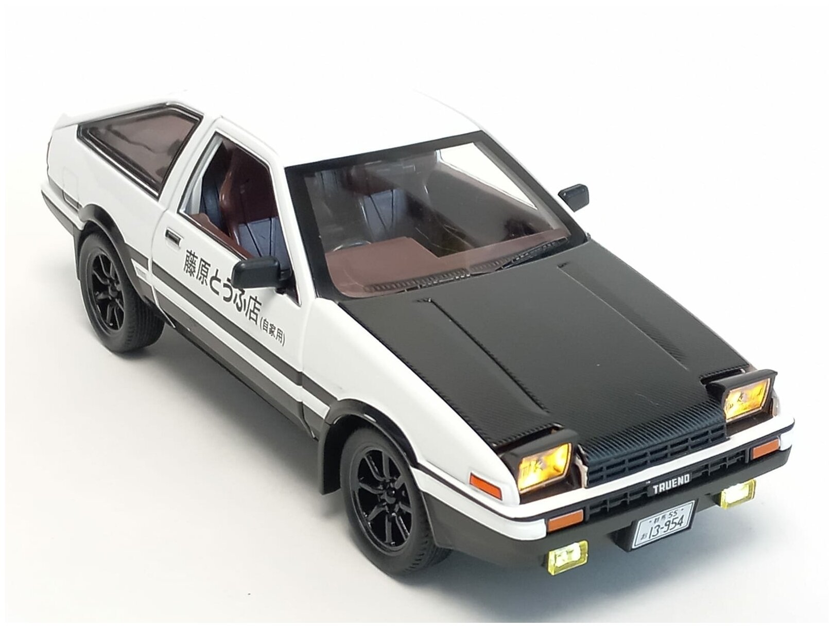 Машинка Toyota Trueno металлическая 1:24 с поднимающимися фарами, свет, звук