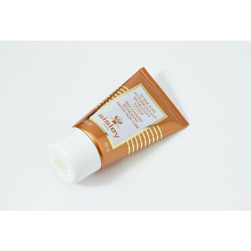 Увлажняющий суперкрем для лица с эффектом автозагара Sisley self tanning facial skincare