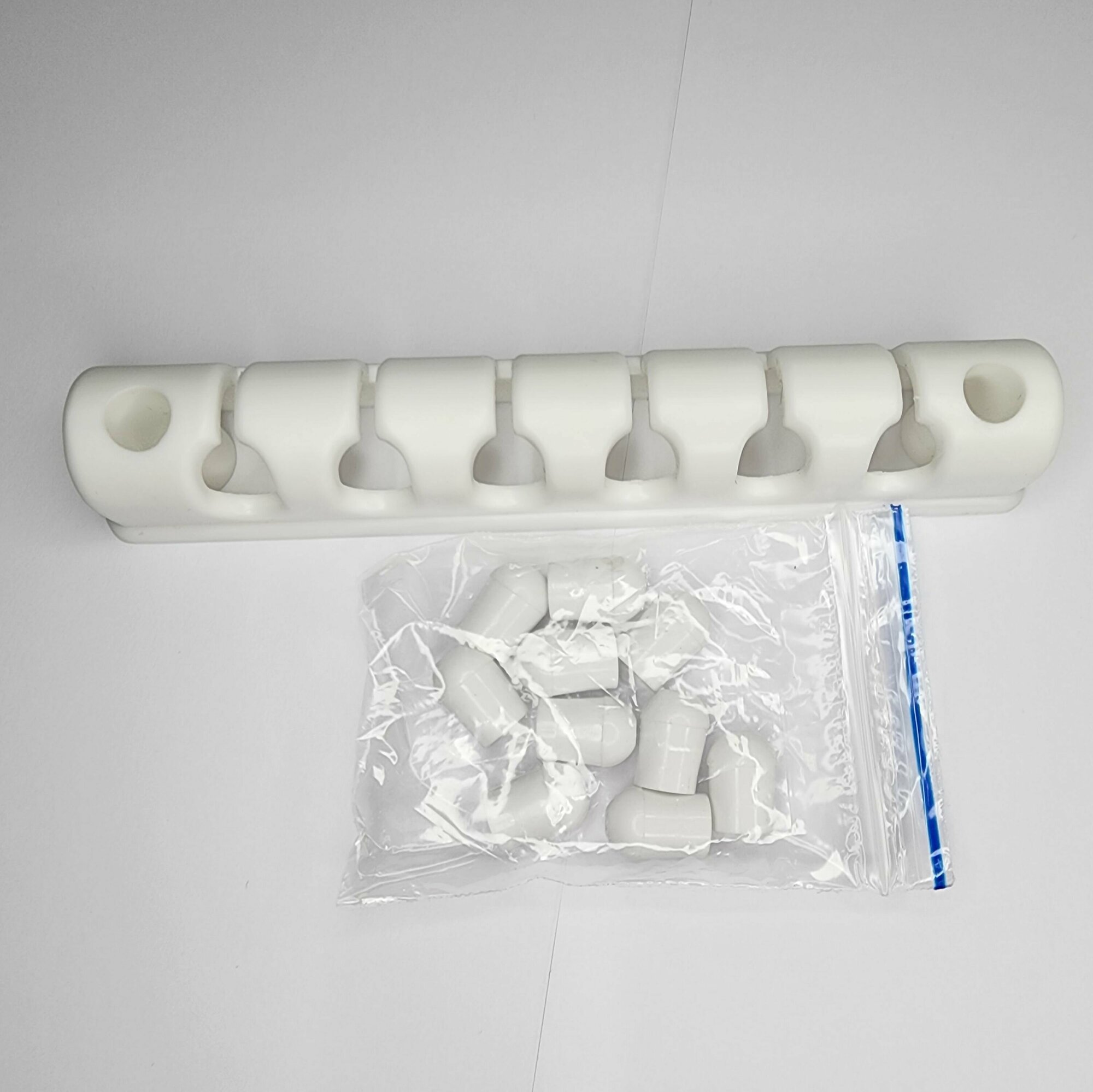 фото Планка для фиксации нитей с колпачками