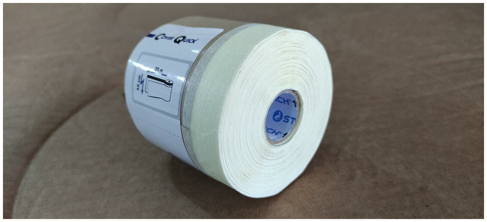 Укрывная маскировочная бумага с малярной лентой 10 см х 20 м STORCH для ремонта и малярных работ - фотография № 3