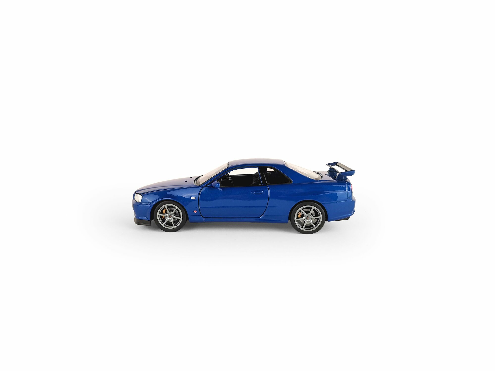 Машинка WELLY 1:24 Nissan Skyline GT-R R34, синий