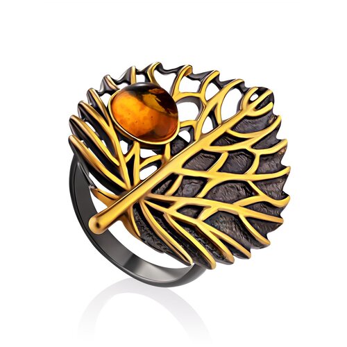 фото Amberholl эффектное кольцо из черненого серебра с позолотой, украшенное янтарём «листочек»
