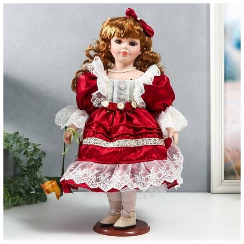 Кукла коллекционная керамика Наташа в бордовом платье с рюшами, с бантом в волосах 40 см