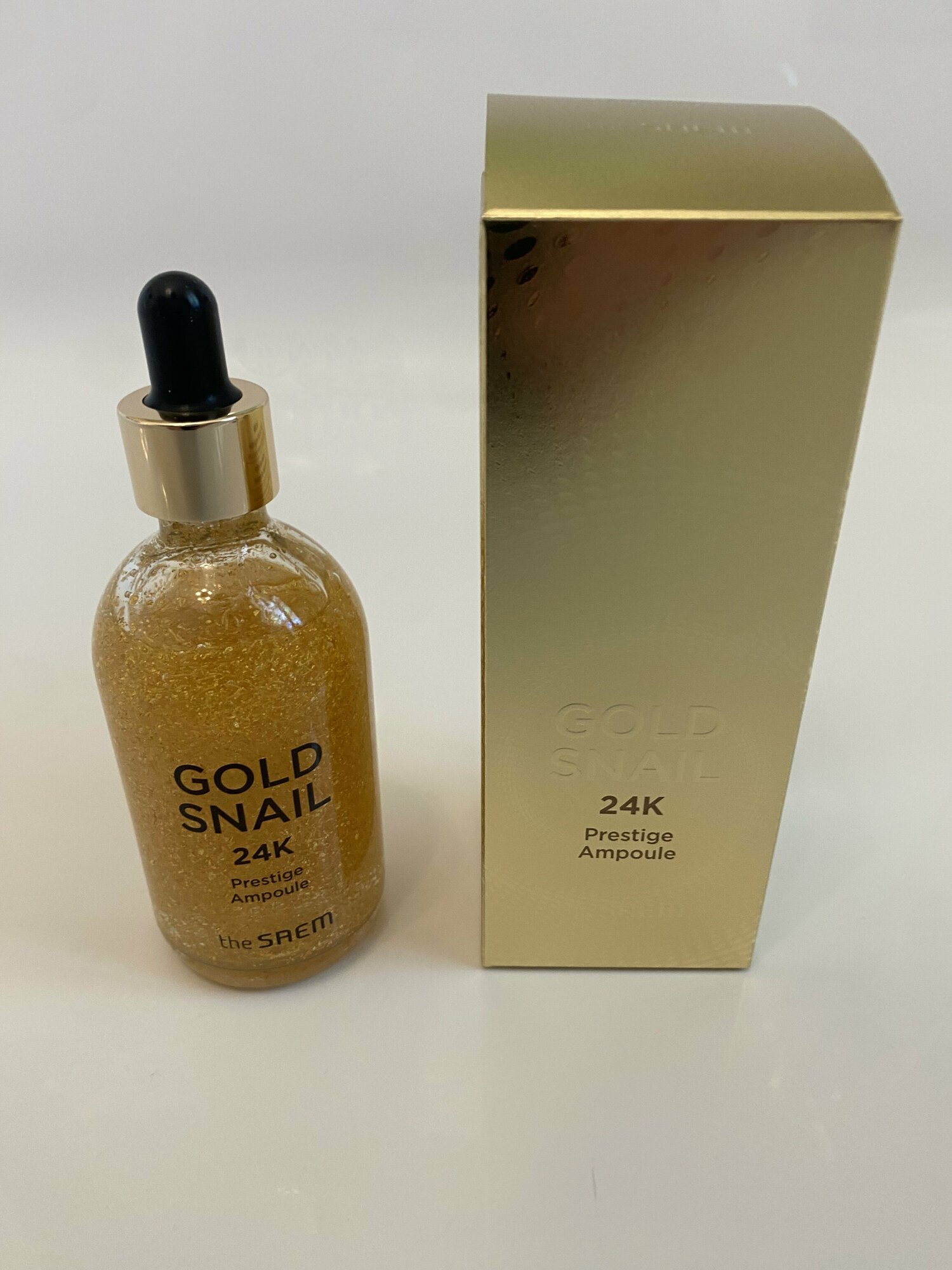 Сыворотка для лица с золотом и муцином улитки The Saem Gold Snail 24K Prestige Ampoule