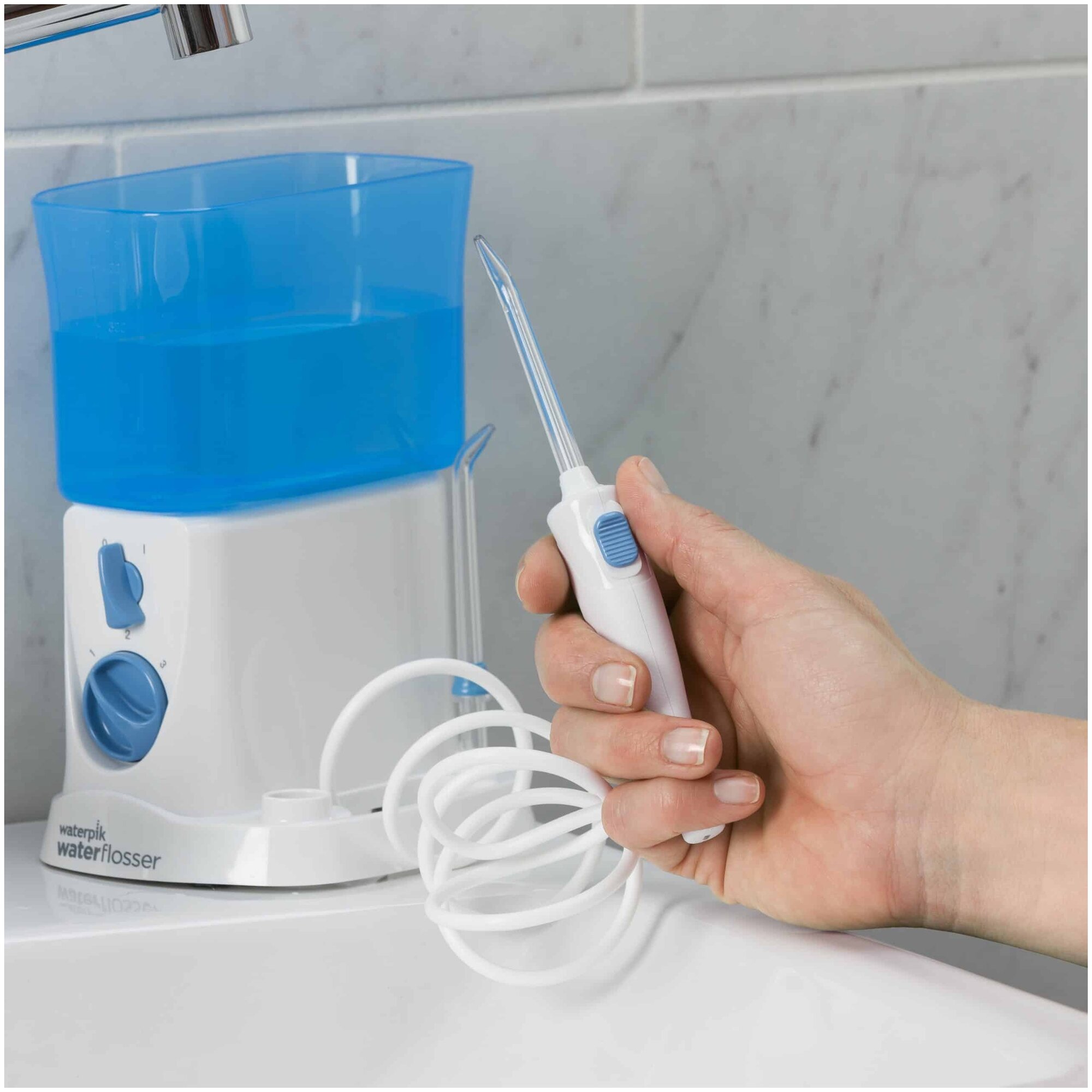 Ирригатор Waterpik WP-300 E2 Traveler - фотография № 9