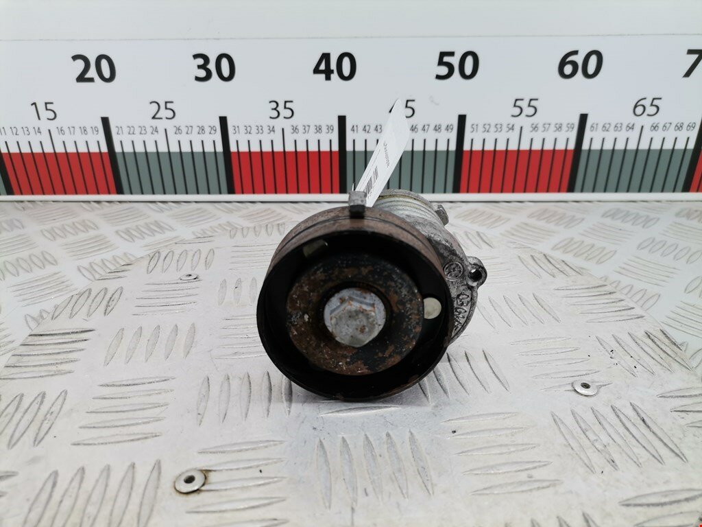 Натяжитель ремня генератора (приводного поликлинового ремня Volkswagen Polo 3 030145299F арт. 1954157
