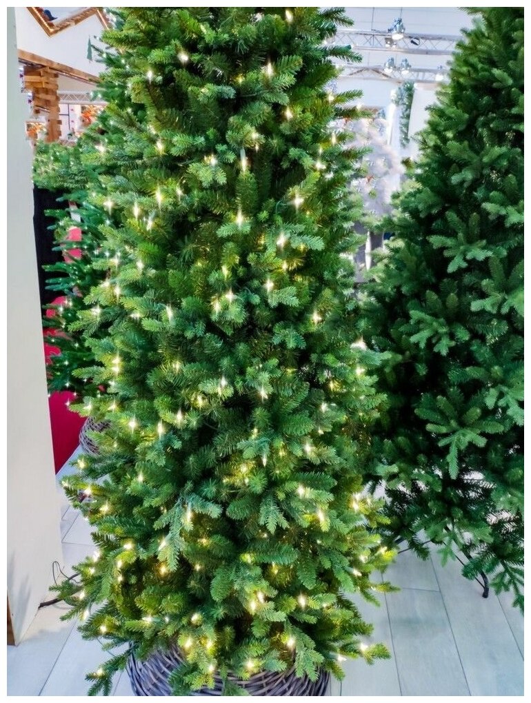 National Tree Company Искусственная стройная елка с гирляндой Каррингтон 228 см, 400 теплых белых LED ламп, литая + ПВХ 31HCARS75L