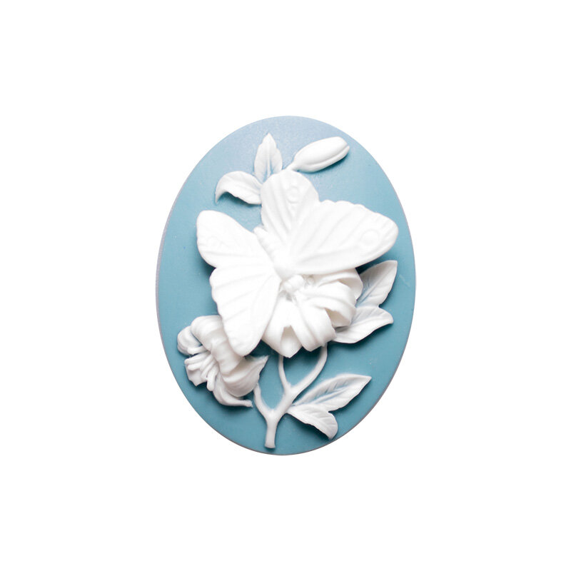 Камея акриловая 40х30мм бабочка белая на бирюзовом 1 шт.