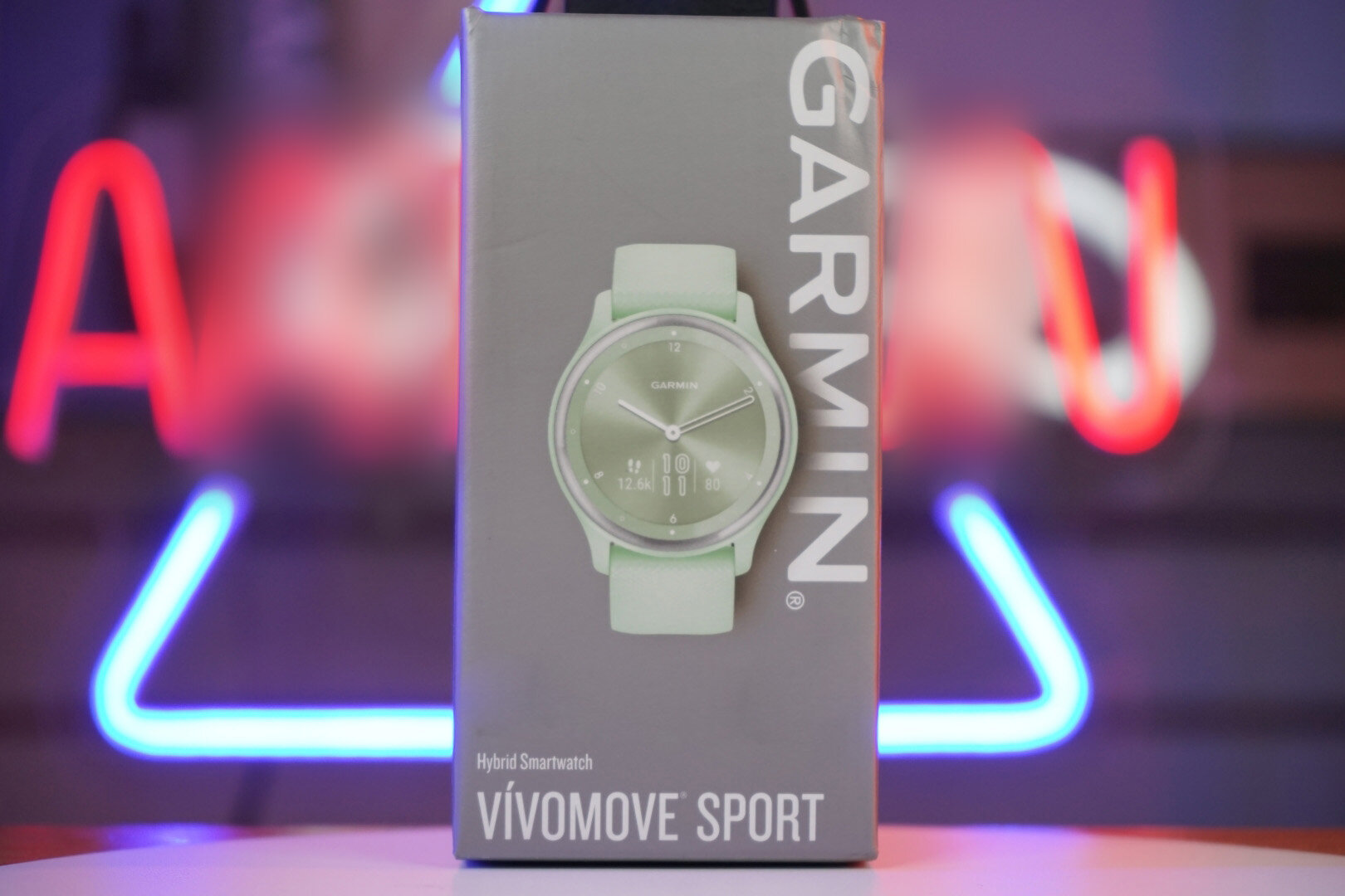 Garmin vivomove Sport - цвета мяты, серебристый безель с силиконовым ремешком