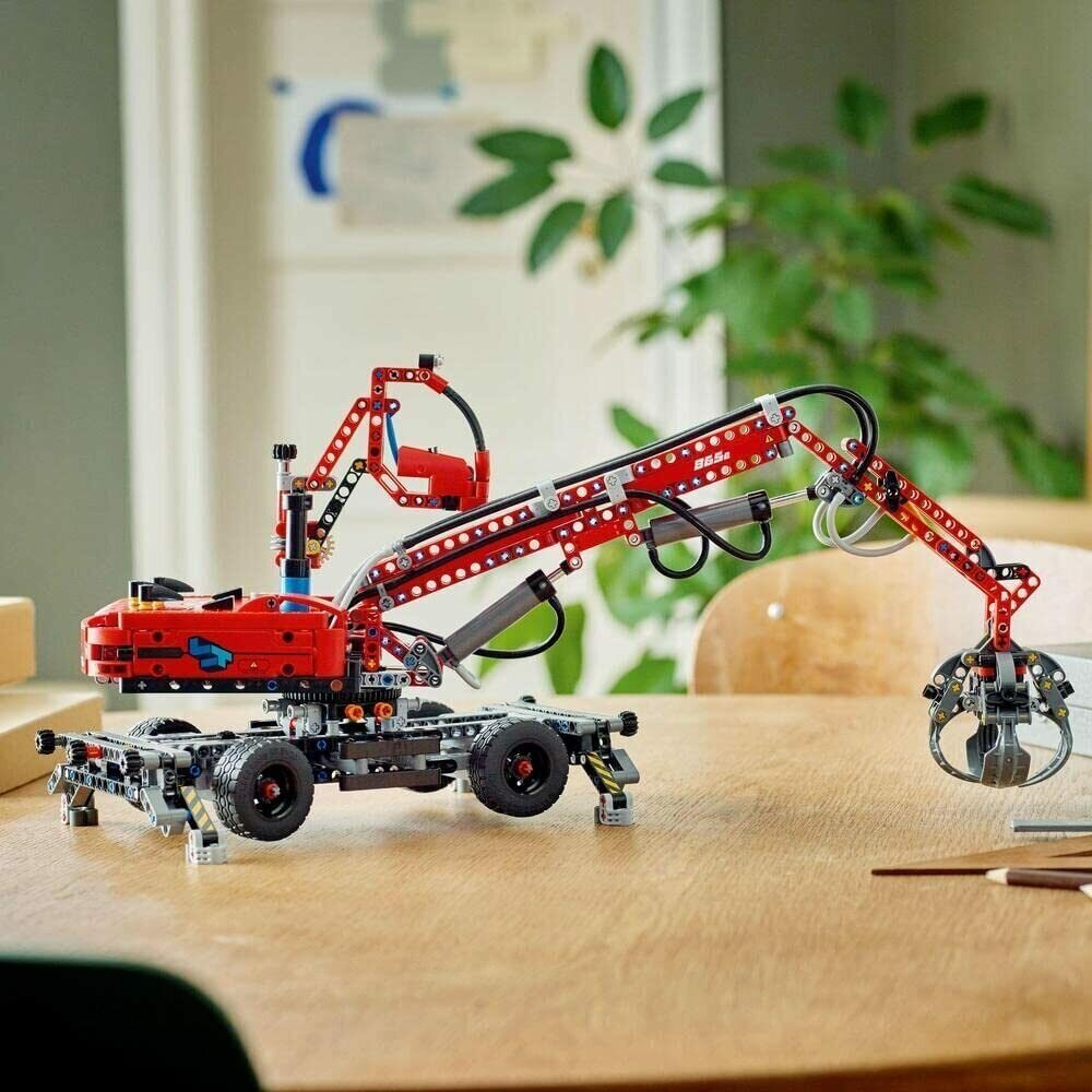 Конструктор LEGO Technic "Погрузчик" 42144 - фото №14