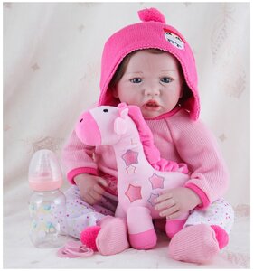 Фото Kaydora Виниловая кукла Реборн (Reborn Dolls) - Девочка в розовом вязаном свитере (56 см)
