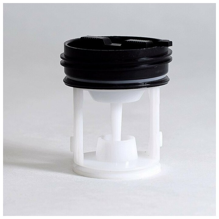 фото Фильтр (заглушка) сливного насоса (помпы) стиральной машины Ariston/Indesit