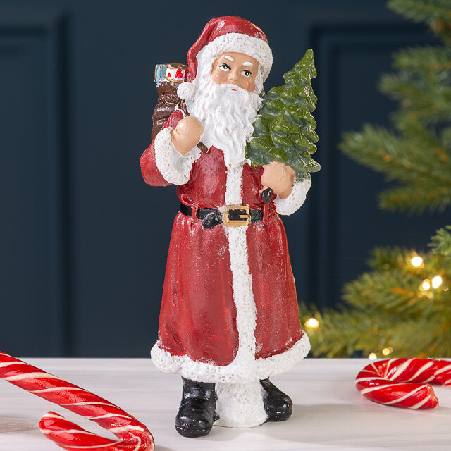Декоративная фигурка Санта Клаус с зеленой елочкой 20 см красный Breitner 22-560