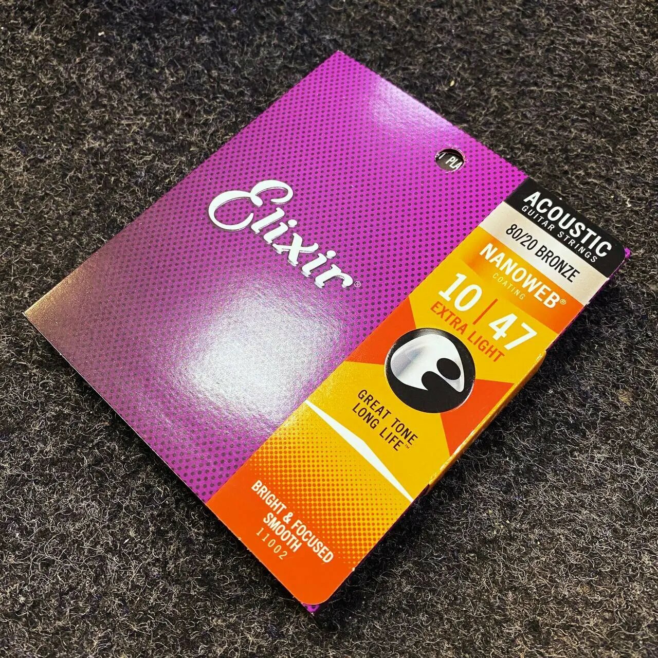 Струны для акустической гитары Elixir Nanoweb 11002 10-47, бронза — фото 1